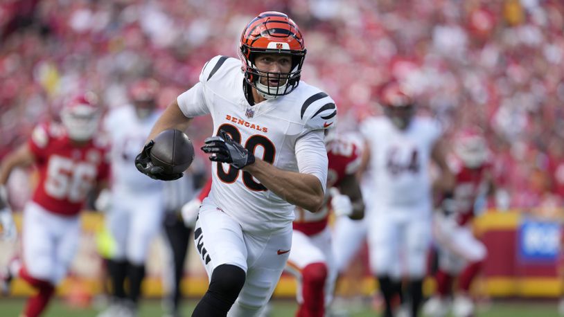 Cincinnati Bengals tight end Mike Gesicki runs with the ball during the first half of an NFL football game against the Kansas City Chiefs Sunday, Sept. 15, 2024, in Kansas City, Mo. (AP Photo/Ed Zurga)