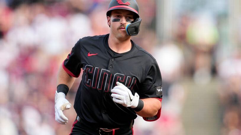 Cincinnati Reds' Spencer Steer runs the bases after hitting a three-run home run against the Los Angeles Dodgers during the first inning of a baseball game Friday, May 24, 2024, in Cincinnati. (AP Photo/Jeff Dean)