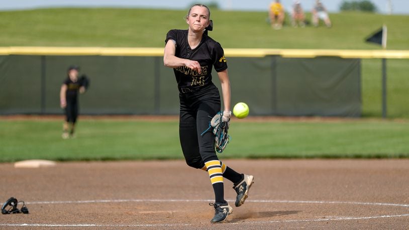Cutline: Shawnee High School junior Aleeseah Trimmer throws a pitch in between innings during their game against Northeastern on May 13 in Springfield. Michael Cooper/CONTRIBUTED