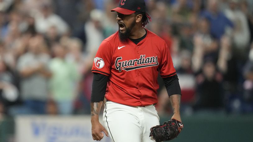 Cleveland Guardians relief pitcher Emmanuel Clase reacts after his teams defeated the Minnesota Twins in a baseball game Monday, Sept. 16, 2024, in Cleveland. (AP Photo/Sue Ogrocki)