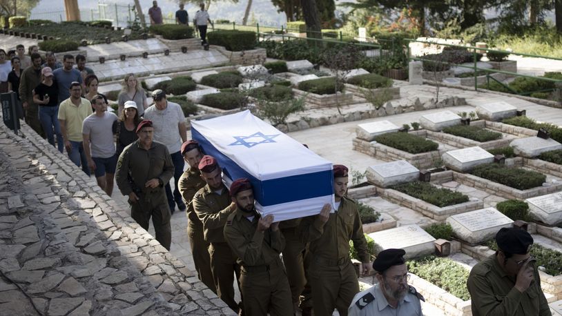 Soldiers carry the coffin of Israeli Army Capt. Eitan Yitzhak Oster, who was killed in action in Lebanon, during his funeral at Mt. Herzl military cemetery in Jerusalem, Wednesday, Oct. 2, 2024. (AP Photo/Maya Alleruzzo)