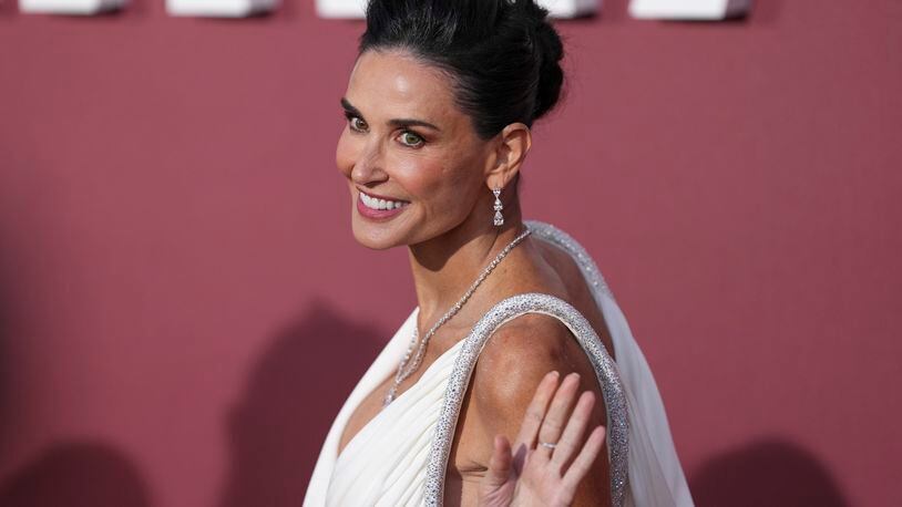 Demi Moore poses for photographers upon arrival at the amfAR Cinema Against AIDS benefit at the Hotel du Cap-Eden-Roc, during the 77th Cannes international film festival, Cap d'Antibes, southern France, Thursday, May 23, 2024. (Photo by Scott A Garfitt/Invision/AP)