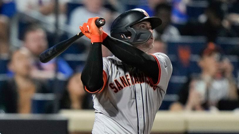 San Francisco Giants' Patrick Bailey watches his grand slam against the New York Mets during the eighth inning of a baseball game Friday, May 24, 2024, in New York. (AP Photo/Frank Franklin II)