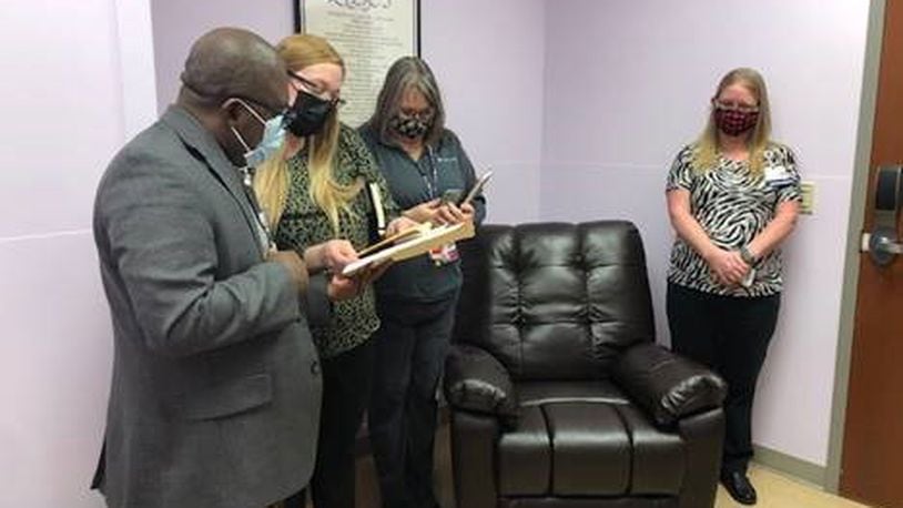 People stand in one of the lavender rooms that have been added to Mercy Health's hospitals in Springfield and Urbana. (Contributed)