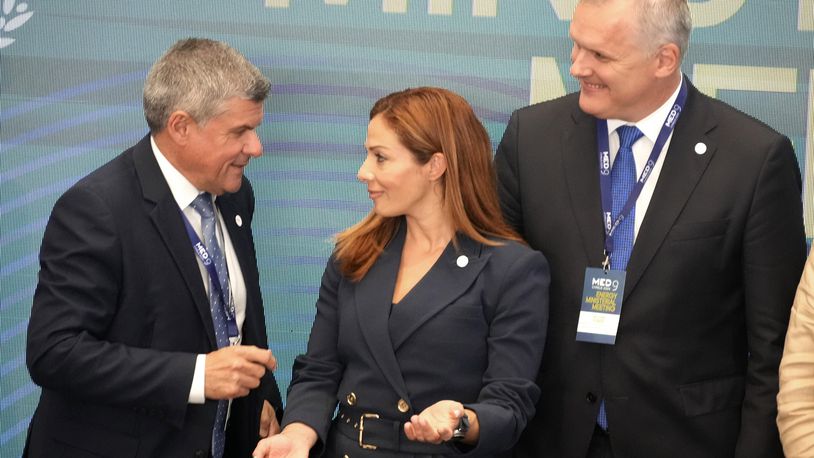 Cypriot Minister of Energy George Papanastasiou, left, talks with his counterparts of Malta Miriam Dalli, center, and Slovenia Bojan Kumer, left, during the MED9 Energy Ministerial Meeting in southern coastal city of Larnaca, Cyprus, Monday, Sept. 23, 2024. (AP Photo/Petros Karadjias)