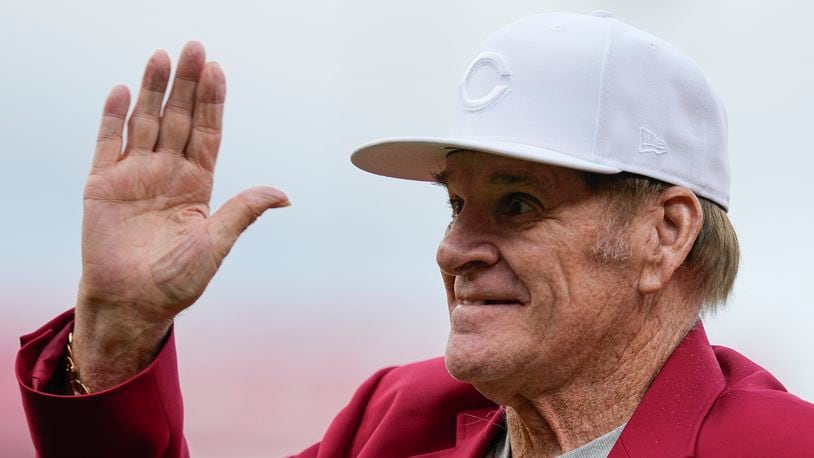 FILE - Former Cincinnati Reds player Pete Rose waves to fans after being introduced during the Reds Hall of Fame Induction Ceremony, July 15, 2023, in Cincinnati. (AP Photo/Darron Cummings, File)