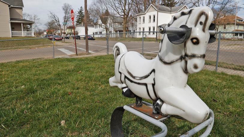 With a group of local residents, UpTurn Ohio is focusing on improving the Northern Heights/ Springhill Neighborhood, bordered by East McCreight Avenue, Buck Creek, Warder Street, Spring Street and both sides of North Limestone Street for the group's first effort. BILL LACKEY/STAFF