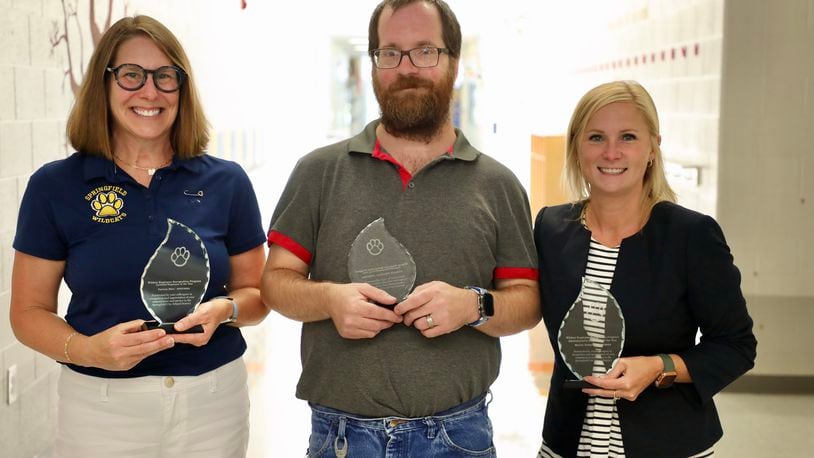 Springfield City School District has named three of its employees as Employees of the Year, including (from left to right) Tricia Blair, Springfield High School English teacher; Fred Waltermier, secretary in the Transportation Department; and Marcie Hobson, a Family Outreach Connections Specialist. Contributed