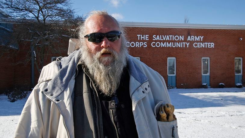Harold Denney, who has been living under the Fountain Avenue Bridge, is taking advantage of the Extreme Cold Weather Homeless Shelter Tuesday, Jan. 16, 2024 in the Springfield Salvation Army gymnasium. The City of Springfield is partnering with the Nehemiah Foundation Faith Community Crisis Response Team, the Salvation Army, Sheltered Inc. and Homefull and has opened an Extreme Cold Weather Homeless Shelter to help those living on the street escape the bitter cold. BILL LACKEY/STAFF