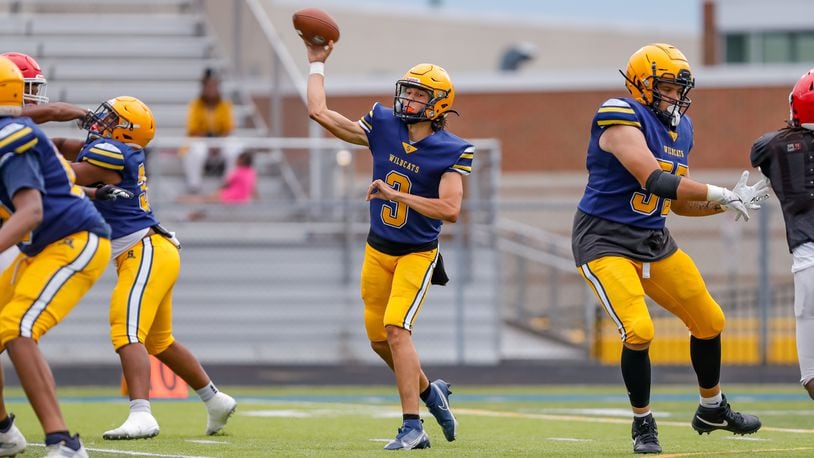 Springfield High School senior quarterback Brent Upshaw throws a pass during their scrimmage game against Cincinnati Princeton on Thursday, Aug. 15 in Springfield. Michael Cooper/CONTRIBUTED