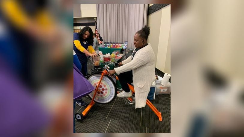 Visitors can create their own smoothie drink by exercising on the smoothie bike during Community Health Foundation's Health Expo '24 on Wednesday, Oct. 9 at the Hollenbeck Bayley Conference Center. The admission-free event will include more than 50 exhibitors offering information on health and wellness topics, screenings, live demonstrations and more. CONTRIBUTED