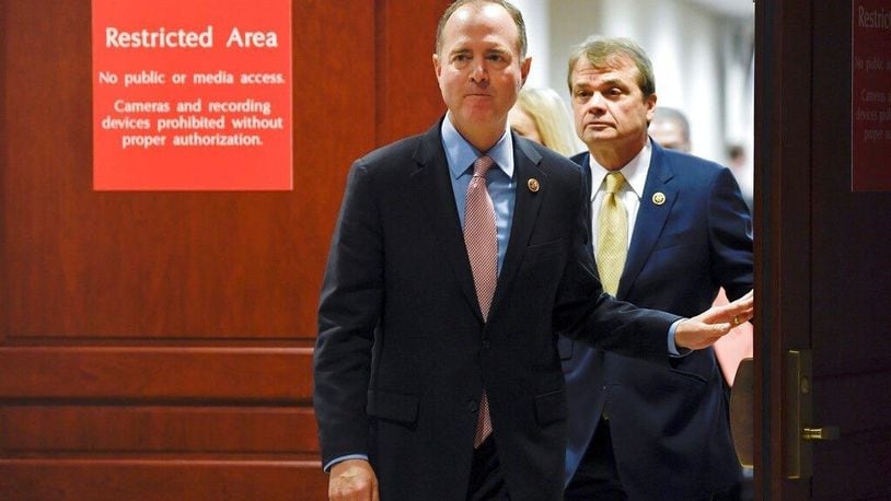 House Intelligence Committee Chairman Adam Schiff, D-Calif., followed by Rep. Mike Quigley, D-Ill., walks out to talk to reporters on Capitol Hill in Washington, Wednesday, Nov. 6, 2019, about the House impeachment inquiry.