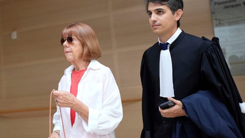 FILE - Gisele Pelicot, left, arrives in the Avignon court house, in Avignon, southern France, Thursday, Sept. 5, 2024. (AP Photo/Lewis Joly, File)