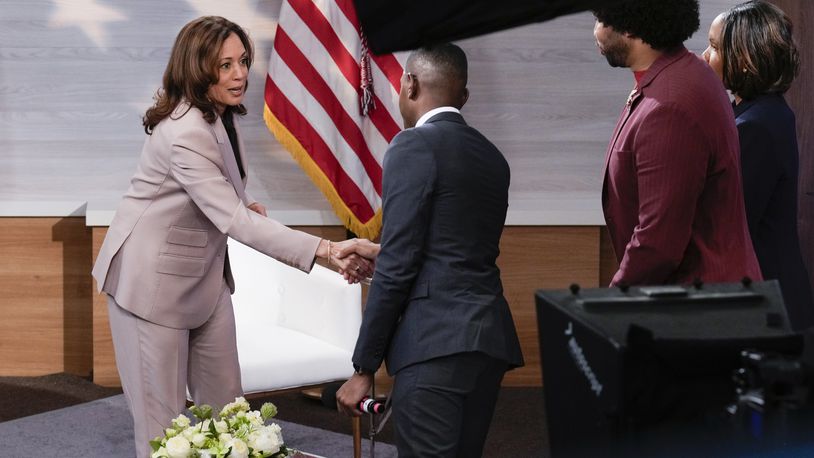 Democratic presidential nominee Vice President Kamala Harris, left, shaking hands with Gerren Keith Gaynor, center, as Eugene Daniels, second from the right, and Tonya Mosley, far right, look on after being interviewed by the National Association of Black Journalists at the WHYY studio in Philadelphia, Tuesday, Sept. 17, 2024. (AP Photo/Jacquelyn Martin)