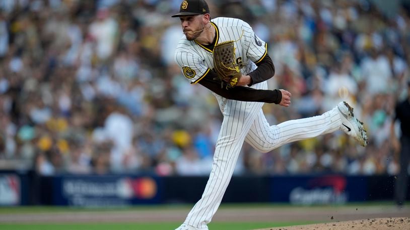 San Diego Padres starting pitcher Joe Musgrove throws to an Atlanta Braves batter during the first inning in Game 2 of an NL Wild Card Series baseball game Wednesday, Oct. 2, 2024, in San Diego. (AP Photo/Gregory Bull)