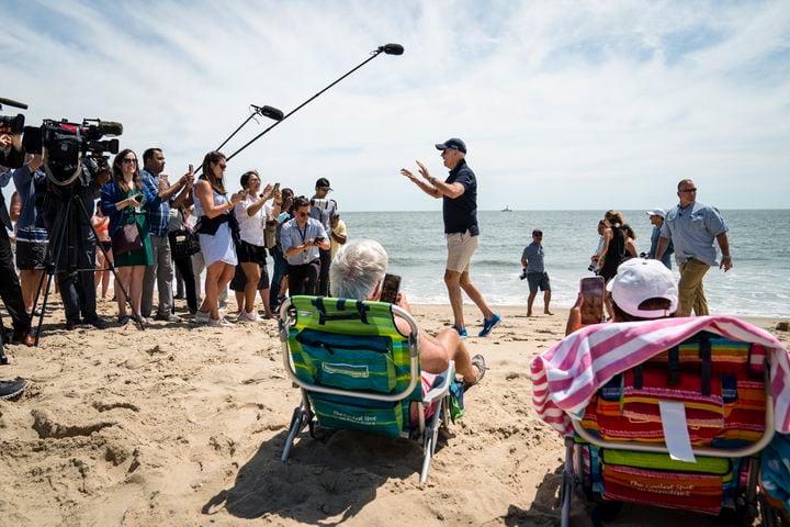 President Joe Biden speaks to members of the White House press corps on the beach in Rehoboth Beach, Del. on Monday, June 20, 2022. (Sarah Silbiger/The New York Times)