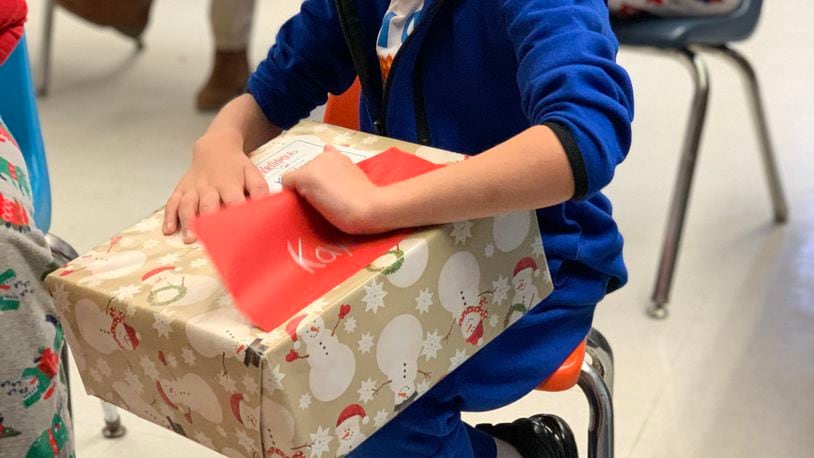 The Springfield Rotary’s 99th annual Christmas party for children with disabilities continued this year despite the coronavirus pandemic. Over 130 Clark County students received personalized gifts from Santa.