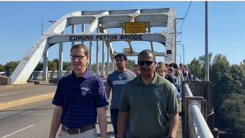 Robert Clark, left, and Patrick Oliver lead Cedarville University students across the Edmund Pettus Bridge in Selma, Alabama. Contributed