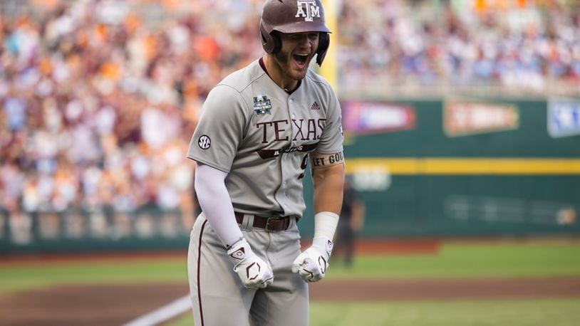 Texas A&M's Gavin Grahovac celebrates after hitting a solo home run against Tennessee during the first inning of Game 1 of the NCAA College World Series baseball finals in Omaha, Neb., Saturday, June 22, 2024. (AP Photo/Rebecca S. Gratz)
