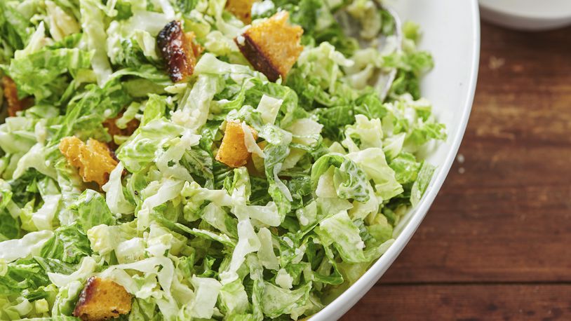 This 2019 image shows a caesar salad recipe in New York. (Cheyenne Cohen via AP)