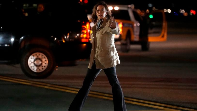 Democratic presidential nominee Vice President Kamala Harris waves as she arrives in San Francisco, Friday, Sept. 27, 2024. (AP Photo/Jeff Chiu)