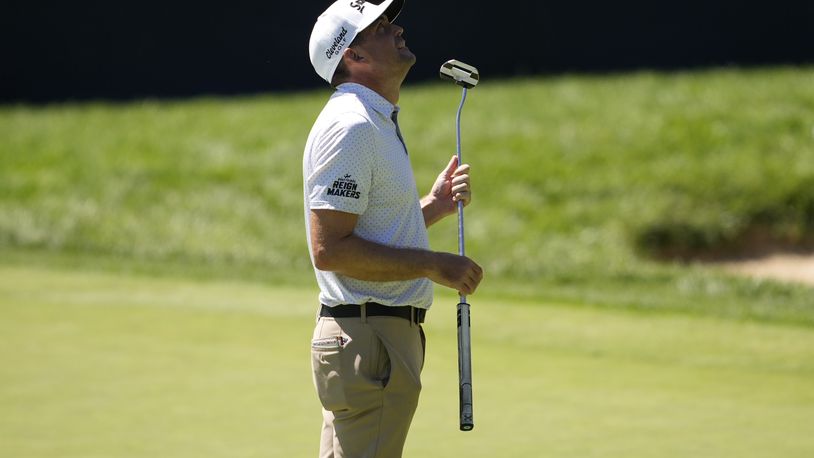 Keegan Bradley looks upward after his shot on the 14th green during the first round of the BMW Championship golf event at Castle Pines Golf Club, Thursday, Aug. 22, 2024, in Castle Rock, Colo. (AP Photo/Matt York)