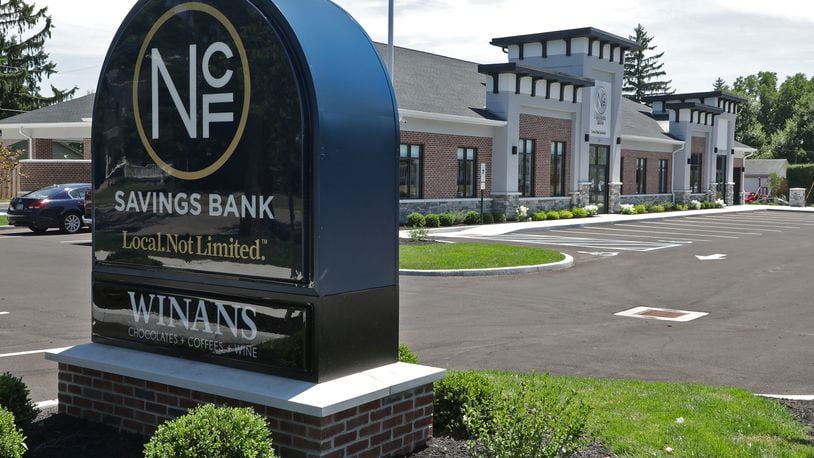 New Carlisle Federal Savings Bank's new branch on North Limestone Street is opening Monday. BILL LACKEY/STAFF