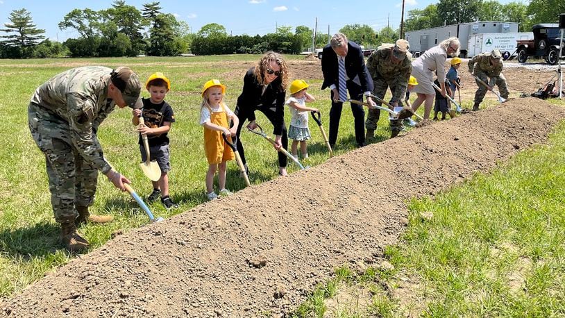 Military and civilian leaders broke ground Monday for construction of a child development center on Area A of Wright-Patterson Air Force Base. THOMAS GNAU/STAFF