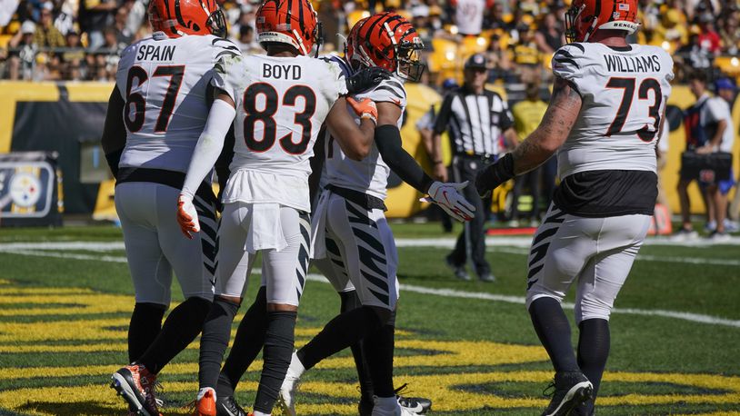 Cincinnati Bengals wide receiver Ja'Marr Chase (1) celebrates with teammates after he caught a touchdown pass against the Pittsburgh Steelers during the second half an NFL football game, Sunday, Sept. 26, 2021, in Pittsburgh. (AP Photo/Gene J. Puskar)