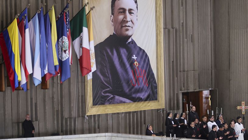 A portrait of Rev. Moisés Lira hangs at the Basilica of Our Lady of Guadalupe during his beatification ceremony in Mexico City, Saturday, Sept. 14, 2024. (AP Photo/Ginnette Riquelme)