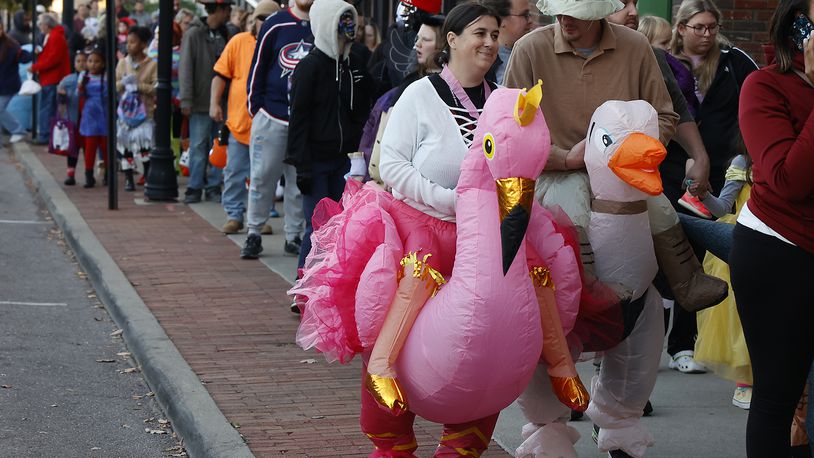 Hundreds of families came out Friday night, Oct. 28, 2022 for the thrid annual Downtown Trick or Treat event in Springfield. More than 20 businesses in the downtown area, along with community groups passed out candy and goodie bags along Fountain Avenue. BILL LACKEY/STAFF