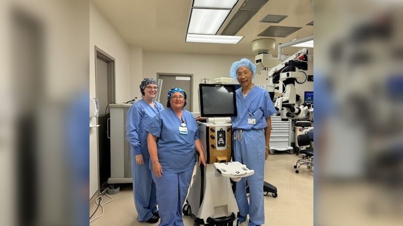 (From left to right) Kelsey Rodman, Surgical RN; Kim Martin, surgical tech; Dr. Gary Lau, ophthalmologist, pose with Phaco equipment, which allows the hospital to perform cataract surgeries. CONTRIBUTED
