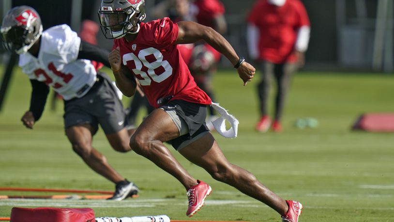 Tampa Bay Buccaneers corner back Nate Brooks (38) runs a drill during an NFL football minicamp Tuesday, June 8, 2021, in Tampa, Fla. (AP Photo/Chris O'Meara)