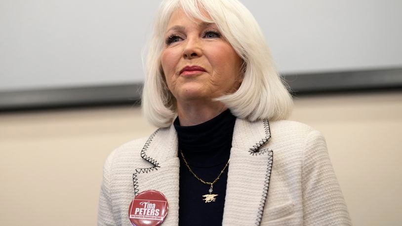 FILE - Candidate Tina Peters speaks during a debate for the state leadership position Saturday, Feb. 25, 2023, in Hudson, Colo. (AP Photo/David Zalubowski, File)