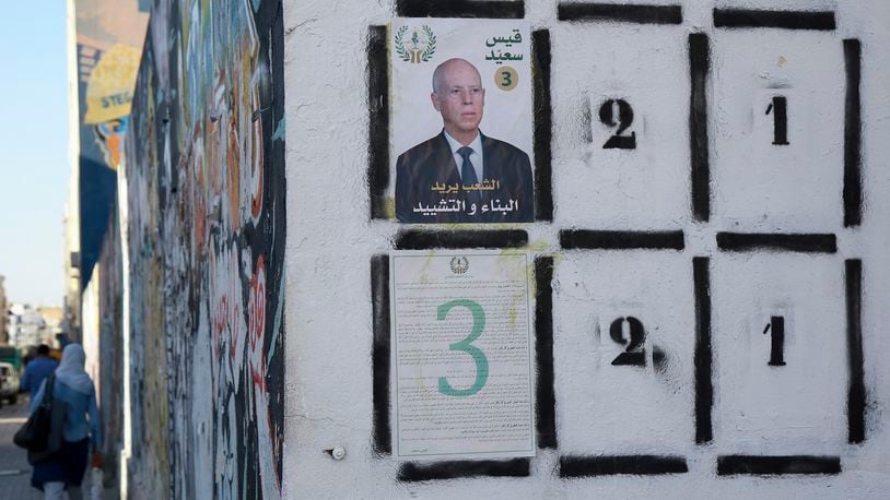 An election banner for Tunisian president and candidate for re-election Kais Saied pictured in Tunis ahead of the upcoming presidential elections, in Tunis, Tunisia, Thursday, Sept. 26, 2024. (AP Photo/Anis Mili)