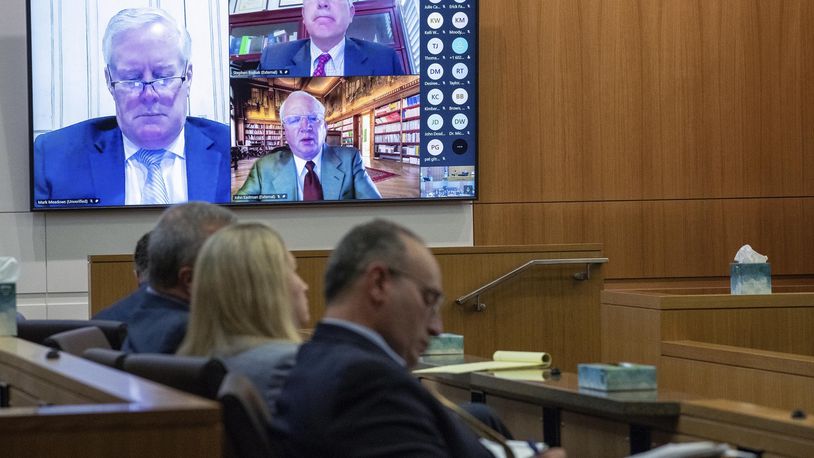 Mark Meadows, left, Stephen Binhak and Jim Eastman appear virtually during a pre-trial hearing in the fake electors case in Maricopa County Superior Court on Wednesday, Aug 28, 2024, in Phoenix. (Cheryl Evans/The Daily News-Sun via AP, Pool)