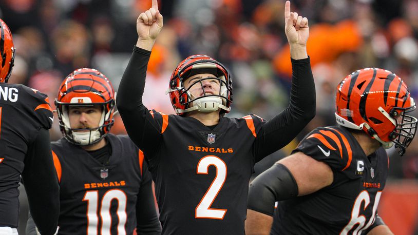Cincinnati Bengals place kicker Evan McPherson (2) celebrates a field goal against the Cleveland Browns during the first half of an NFL football game in Cincinnati, Sunday, Jan. 7, 2024. (AP Photo/Jeff Dean)