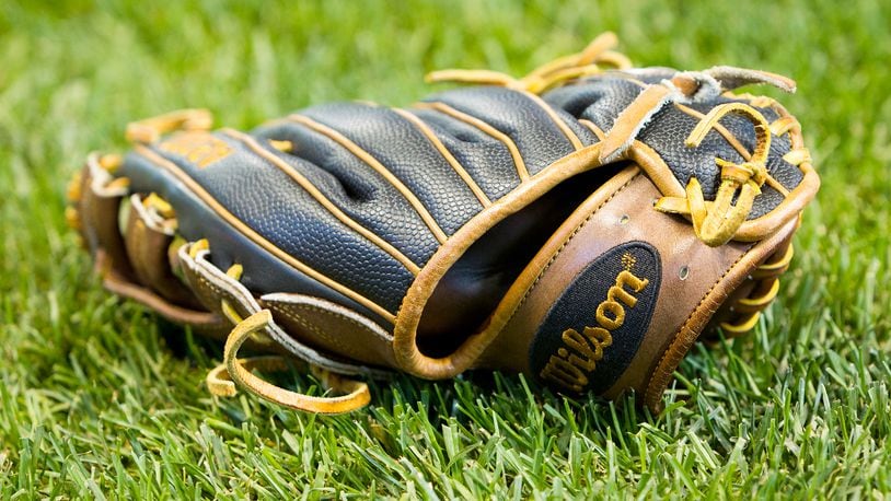 MILWAUKEE, WI - APRIL 22:  A baseball glove sits on the field before the game between the Philadelphia Phillies and Milwaukee Brewers at Miller Park on April 22, 2016 in Milwaukee, Wisconsin. (Photo by Dylan Buell/Getty Images)