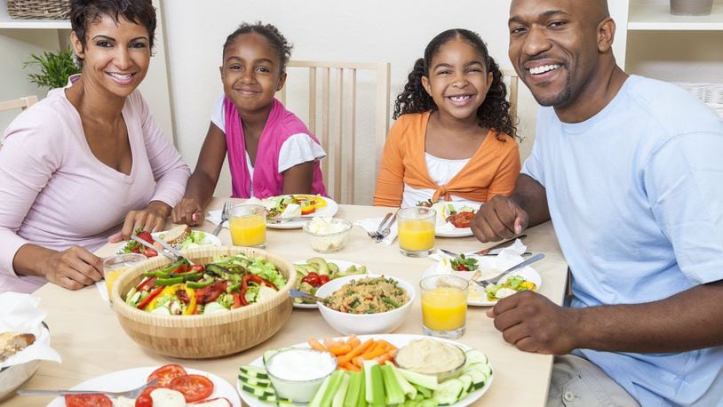 Parents can lead by example — because children are watching — when it comes to healthy eating. CONTRIBUTED