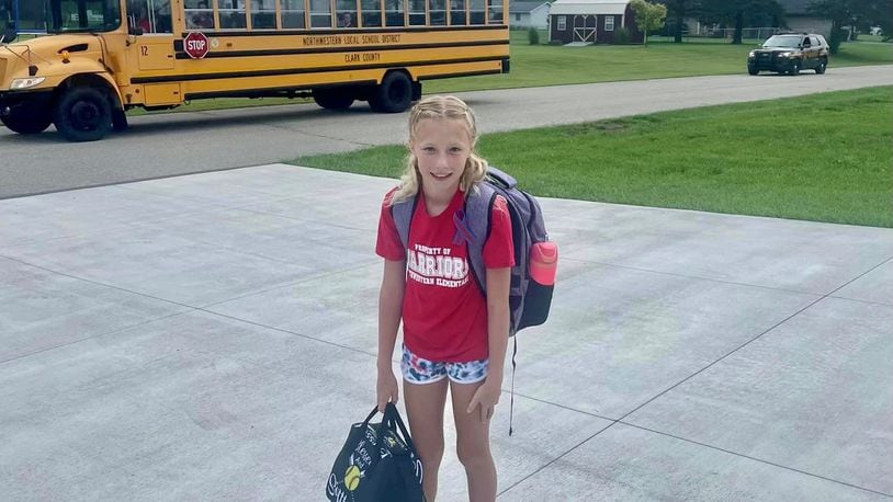 Kimberly Shope said she and husband Mike put their daughter Taylor on the school bus for her first day of fifth grade at Northwestern Elementary, excited to start the new school year Tuesday. The bus was hit by a minivan, one student was killed, and 23 injured. When Northwestern resumed classes Friday, Taylor rode the bus to school as deputies and others comforted students and parents. CONTRIBUTED