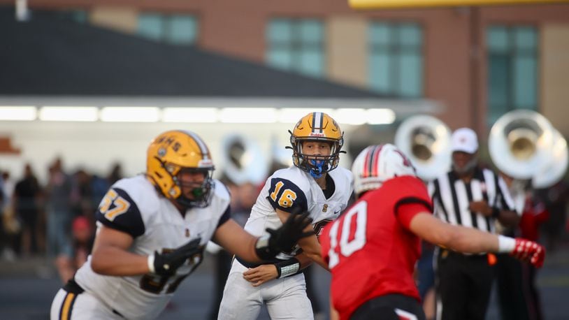 Springfield's Brent Upshaw throws a pass against Wayne on Friday, Sept. 8, 2023, in Huber Heights. David Jablonski/Staff