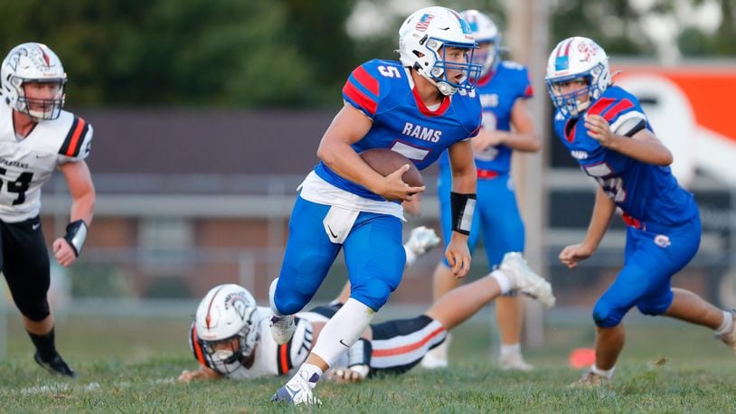 Greeneview High School senior Alex Horney runs the ball during their game against Waynesville on Thursday night at Don Nock Field in Jamestown. Horney rushed for a career-high 232 yards and four TDs as the Rams won 40-28. Michael Cooper/CONTRIBUTED