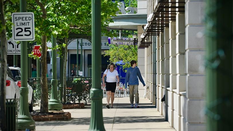 Shoppers enjoy a sunny day at The Greene Town Center in Beavercreek on Tuesday, May 16, 2024. MARSHALL GORBY / STAFF