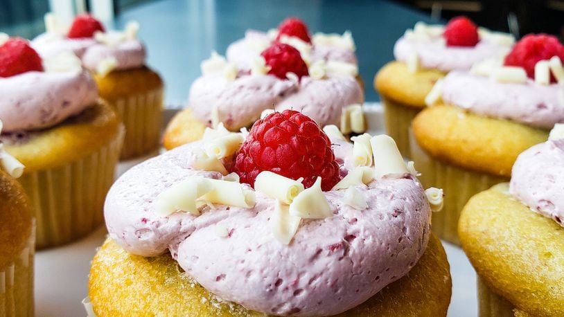 Molly's Cupcakes recently opened in Liberty Center. The new dessert destination, which is the first in Ohio, also has locations in Chicago, New York City, and Iowa City. This is the raspberry and cream cupcake. NICK GRAHAM/STAFF