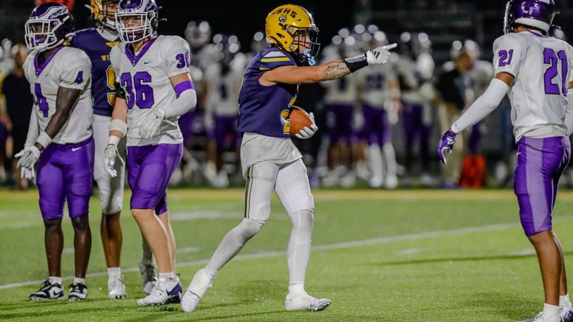 Springfield High School senior wide receiver Quenta Wafer, Jr.
signals first down during their game against Gonzaga College High School earlier this season in Springfield. Michael Cooper/CONTRIBUTED