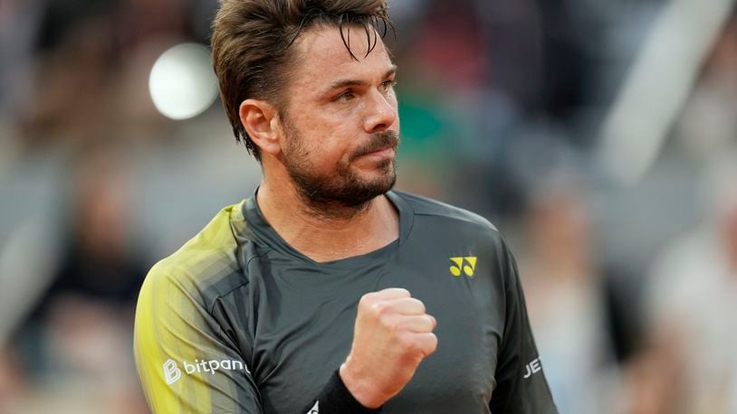 Switzerland's Stan Wawrinka reacts during his first round match against Britain's Andy Murray of the French Open tennis tournament at the Roland Garros stadium in Paris, Sunday, May 26, 2024. (AP Photo/Thibault Camus)