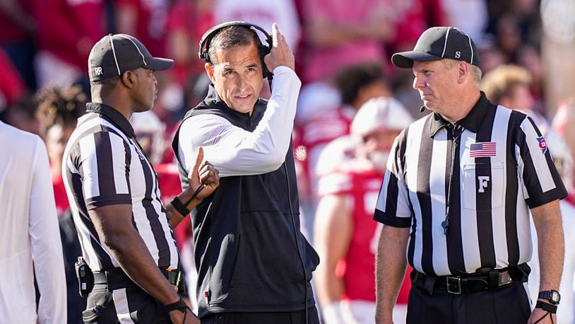 Wisconsin coach Luke Fickell talks with officials during the second half of an NCAA college football game against South Dakota, Saturday, Sept. 7, 2024, in Madison, Wis. (AP Photo/Andy Manis)