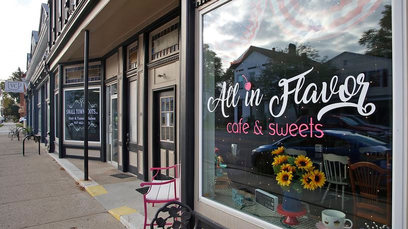 The lights inside All in Flavor Cafe & Sweets along Chillicothe Street in South Charleston are dark Wednesday, Oct. 18, 2023 after the restaurant closed its doors for good Tuesday. BILL LACKEY/STAFF