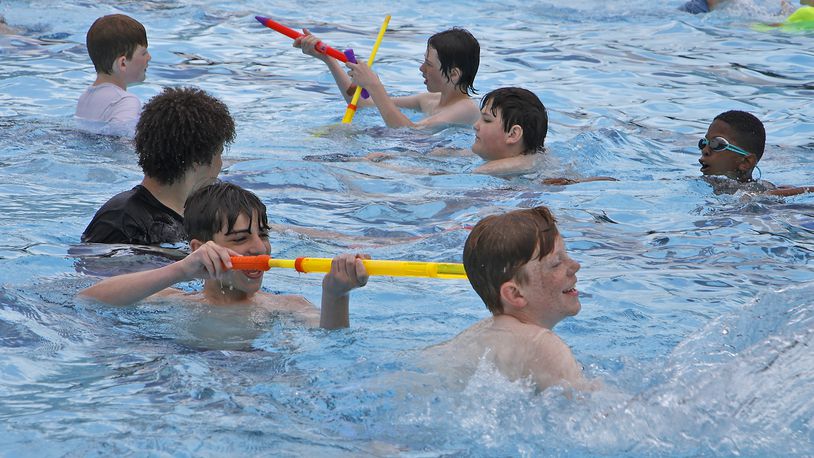 Tecumseh Middle School students got a chance to take an early dip in the New Carlisle Pool Wednesday, May 22, 2024. The pool officially opens to the public on Saturday for the Memorial Day weekend. BILL LACKEY/STAFF