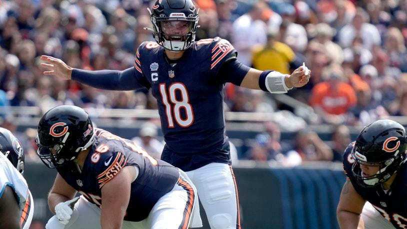 Chicago Bears quarterback Caleb Williams calls a play at the line of scrimmage during the first half of an NFL football game against the Tennessee Titans on Sunday, Sept. 8, 2024, in Chicago. (AP Photo/Nam Y. Huh)